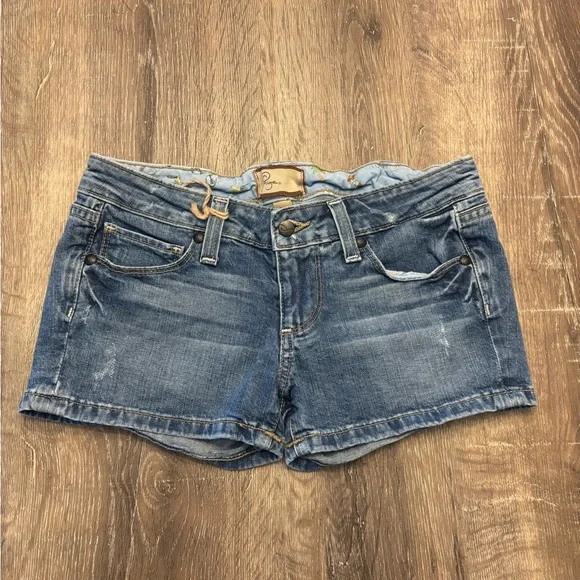 PAIGE Distressed Medium Blue Denim Shorts - Picture 8 of 8